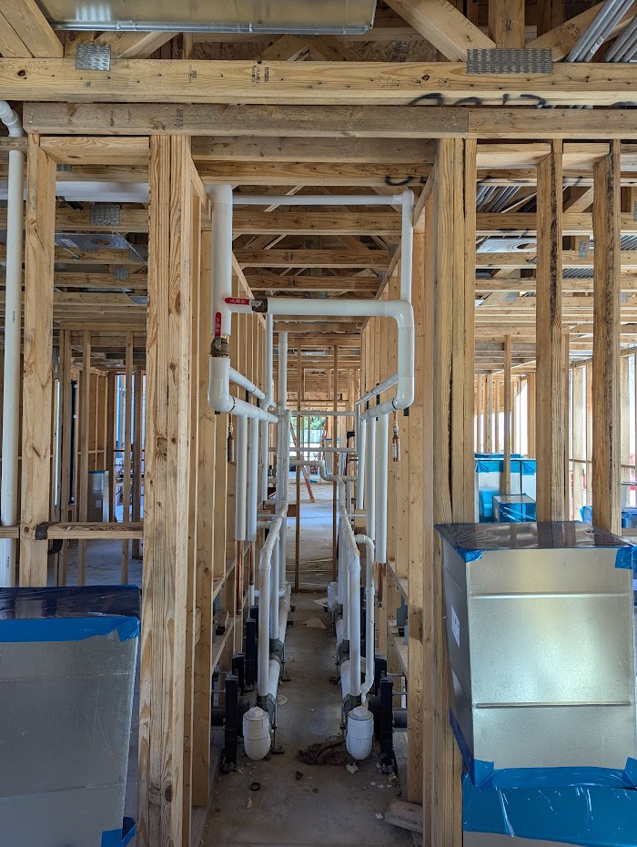 Domestic hot water pipe insulation preventing heat loss - Wisconsin installation