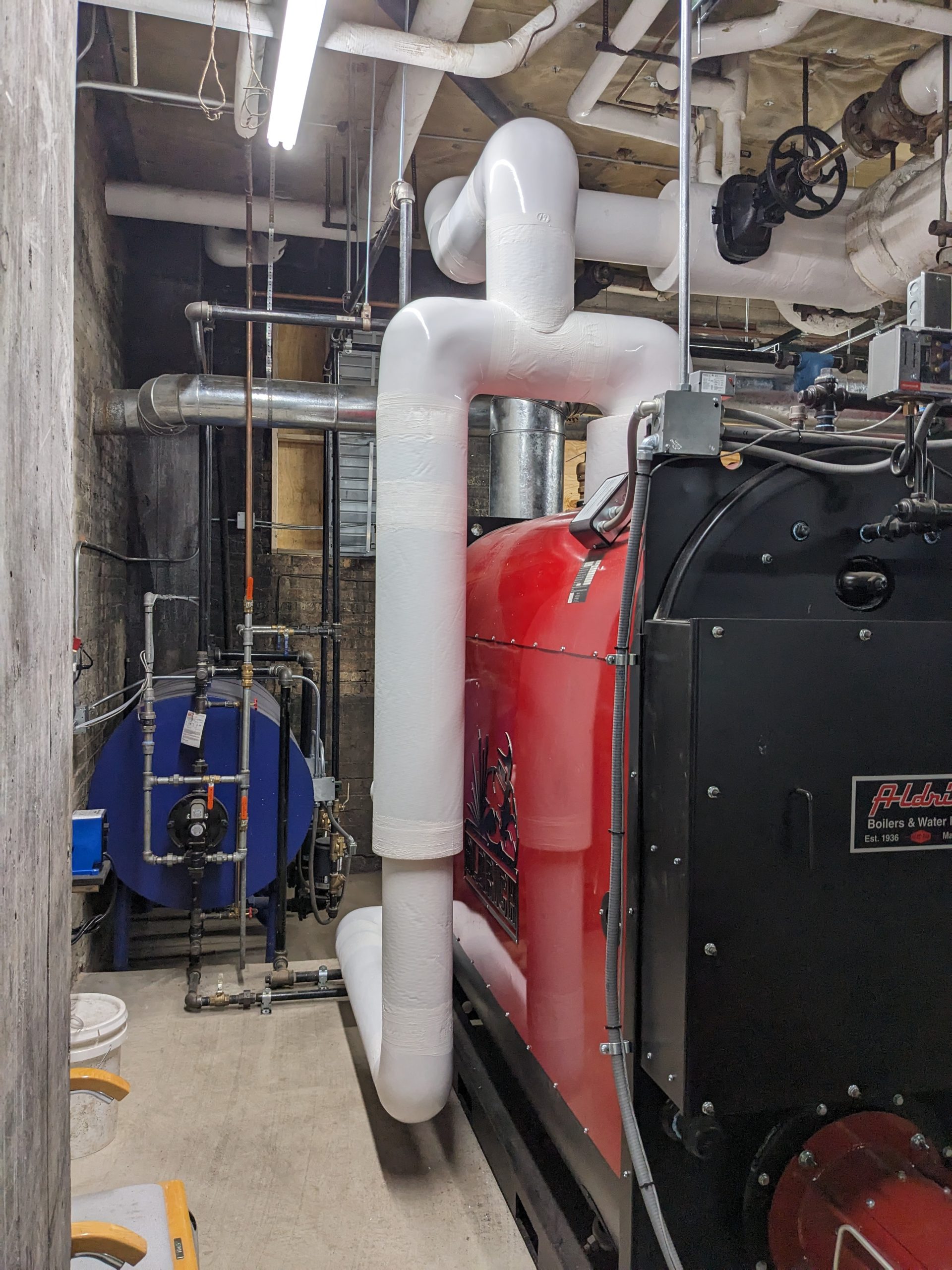 Boiler insulation installation for energy efficiency and safety - Wisconsin
