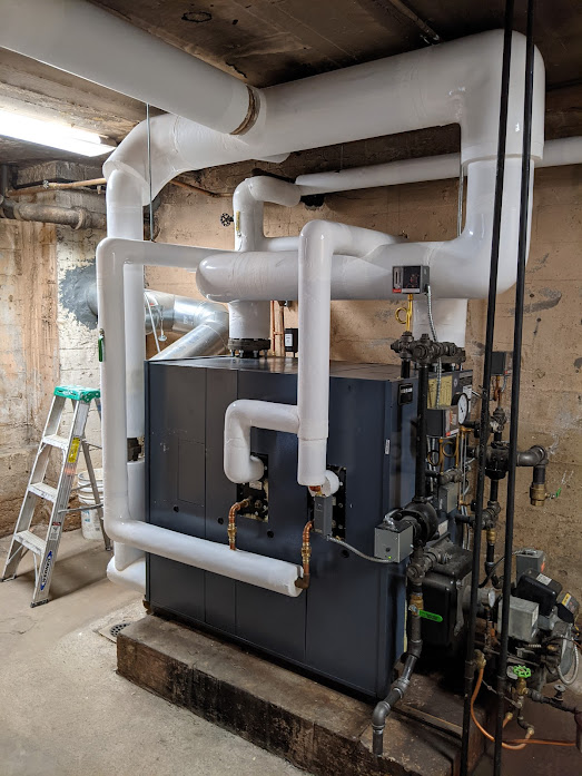 Boiler steam line insulation for safety and efficiency - Wisconsin industrial installation
